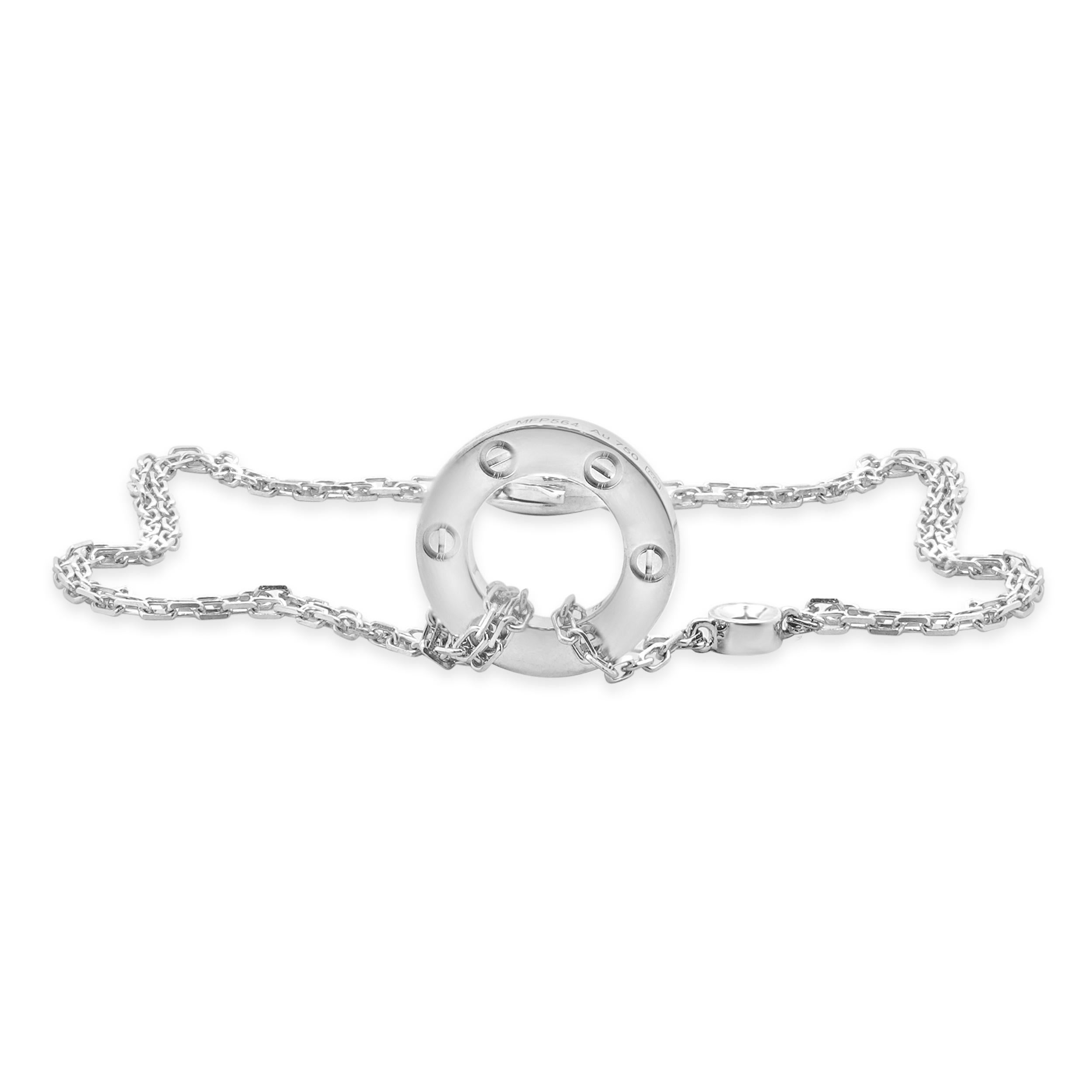 Designer: Cartier
Material: 18K white gold
Diamond: 2 round brilliant cut = 0.03cttw
Color: G
Clarity: VS2
Serial # MFP564


Complete with original box and papers
