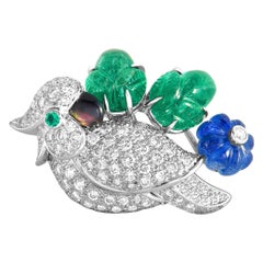 Cartier 18 Karat White Gold Diamond Pave, Emerald and Sapphire Bird Pendant