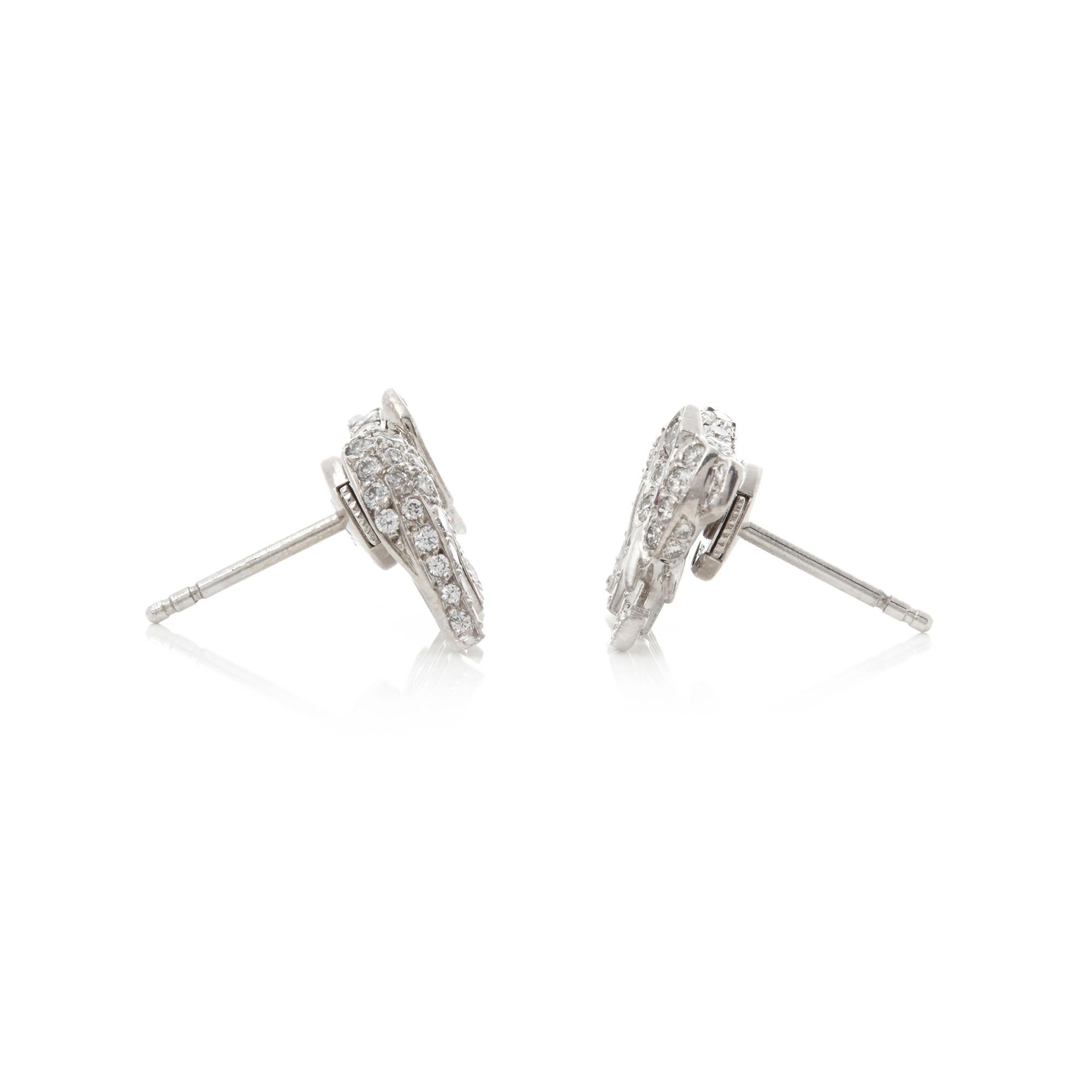 Code: COM2112
Brand: Cartier
Description: 18k White Gold Diamond & Ruby Elephant Bespoke Stud Earrings
Accompanied With: Box Only
Gender: Ladies
Earring Length: 1.1cm
Earring Width: 1.4cm
Earring Back: Lock
Condition: 9
Material: White Gold
Total