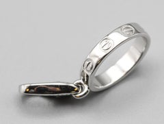 Cartier: 18 Karat Weißgold Love-Armband mit Anhänger