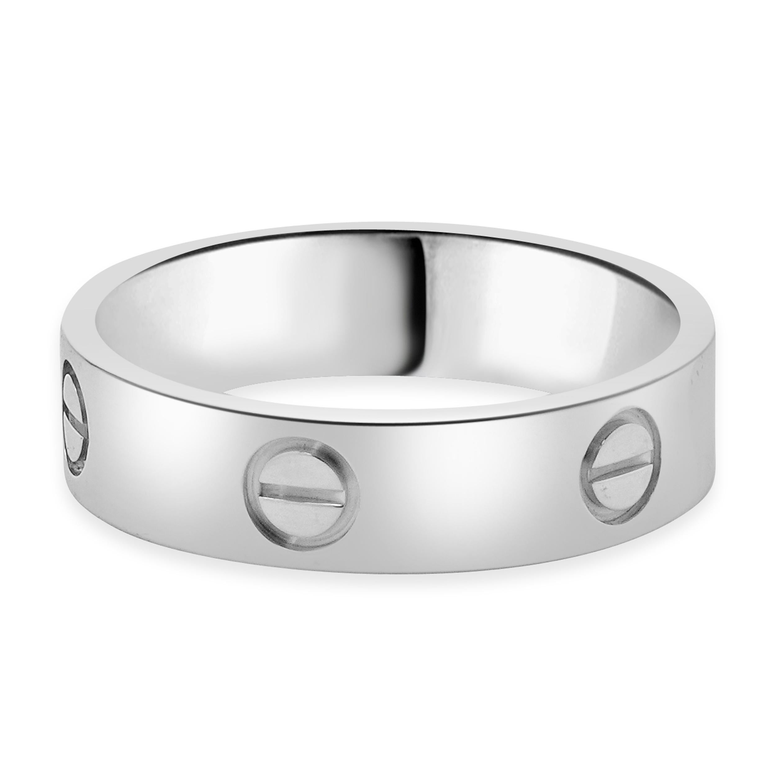 Designer: Cartier
Material: 18K white gold
Serial # VQRXXX
Size: 62