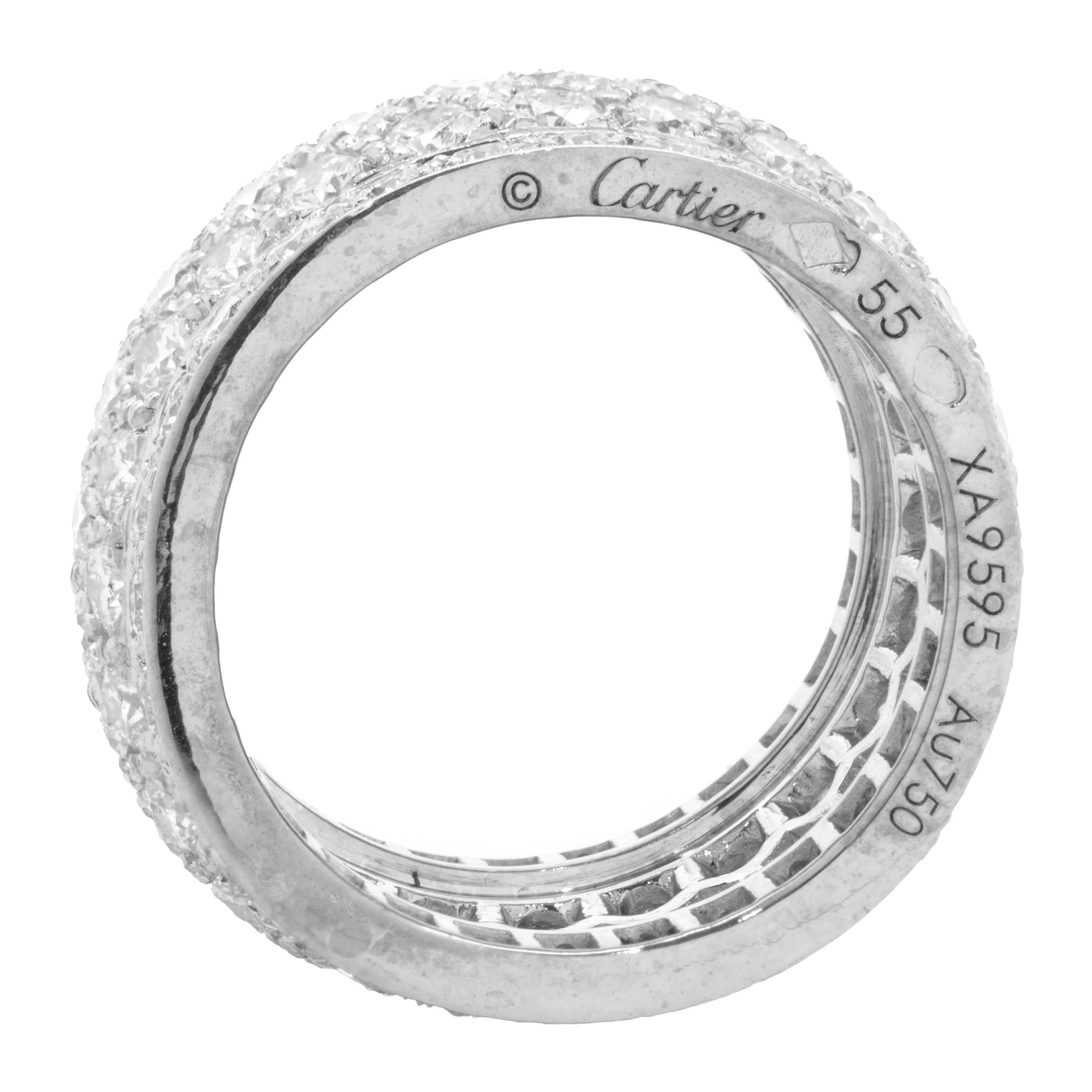 Designer: Cartier
Material: 18K white gold
Diamond: 128 round brilliant cut = 6.50cttw
Color: F
Clarity: VVS1
Serial # XA9XXX
Size: 7.25
Weight: 12.06 grams

No box or papers included
Guaranteed authentic by seller 