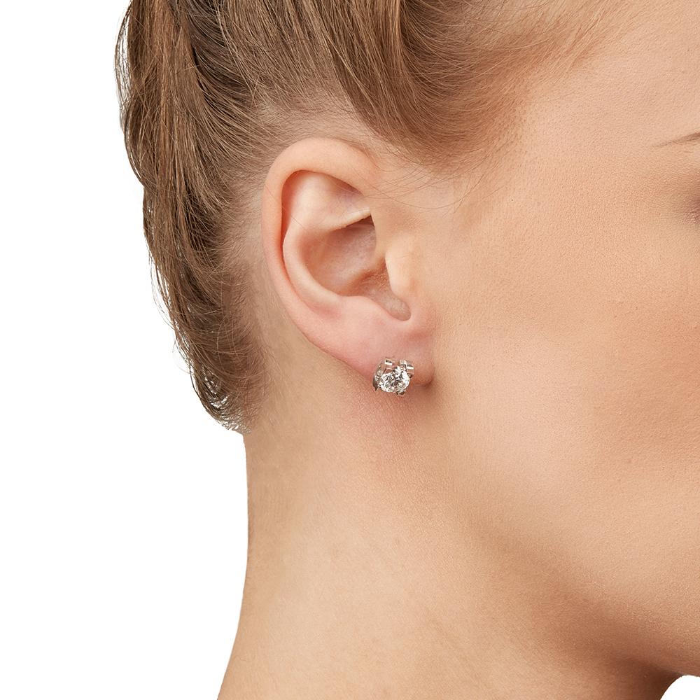 cartier diamond earrings c on side