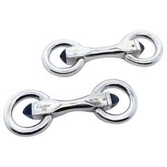 Gemelli Cartier a staffa in oro bianco 18 carati con zaffiro