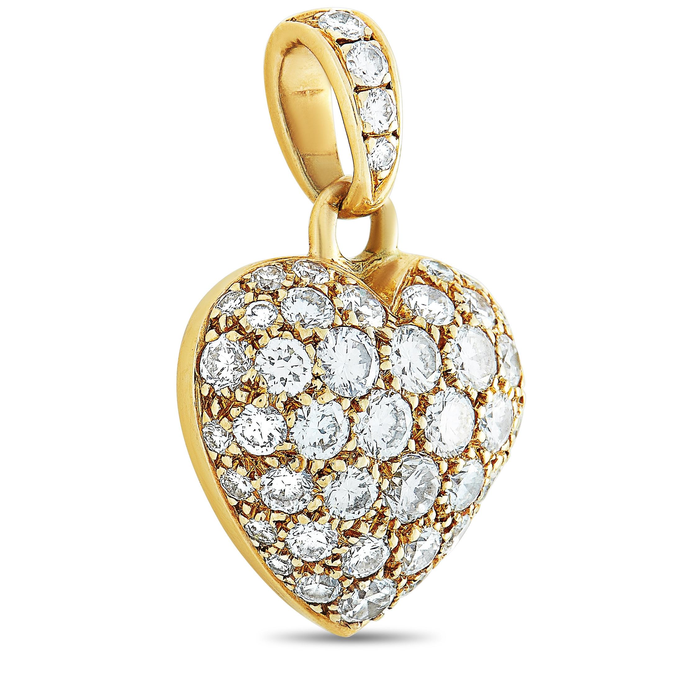 This Cartier heart pendant is made of 18K yellow gold and weighs 3.1 grams, measuring 0.80” in length and 0.50” in width. The pendant is set with diamonds that boast grade F color and VS1 clarity and amount to 1.30 carats.
 
 Offered in estate