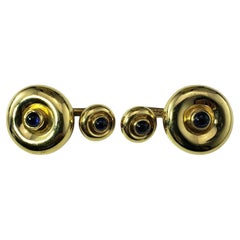 Cartier Boutons de manchette en or jaune 18 carats et saphir cabochon #21242