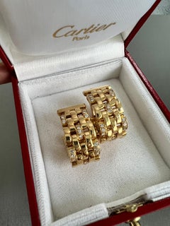 Boucles d'oreilles à pince en or jaune 18 carats et diamants de Cartier, années 1970