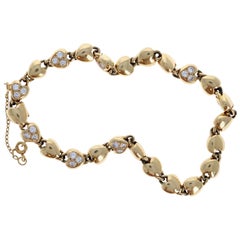 Cartier 18 Karat Yellow Gold and Diamond Heart Link Bracelet 24g Cartier 18 Karat Yellow Gold and Diamond Heart Link Bracelet 24g