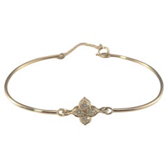 Cartier 18 Karat Yellow Gold and Diamond Quatrefoil Bracelet #16807