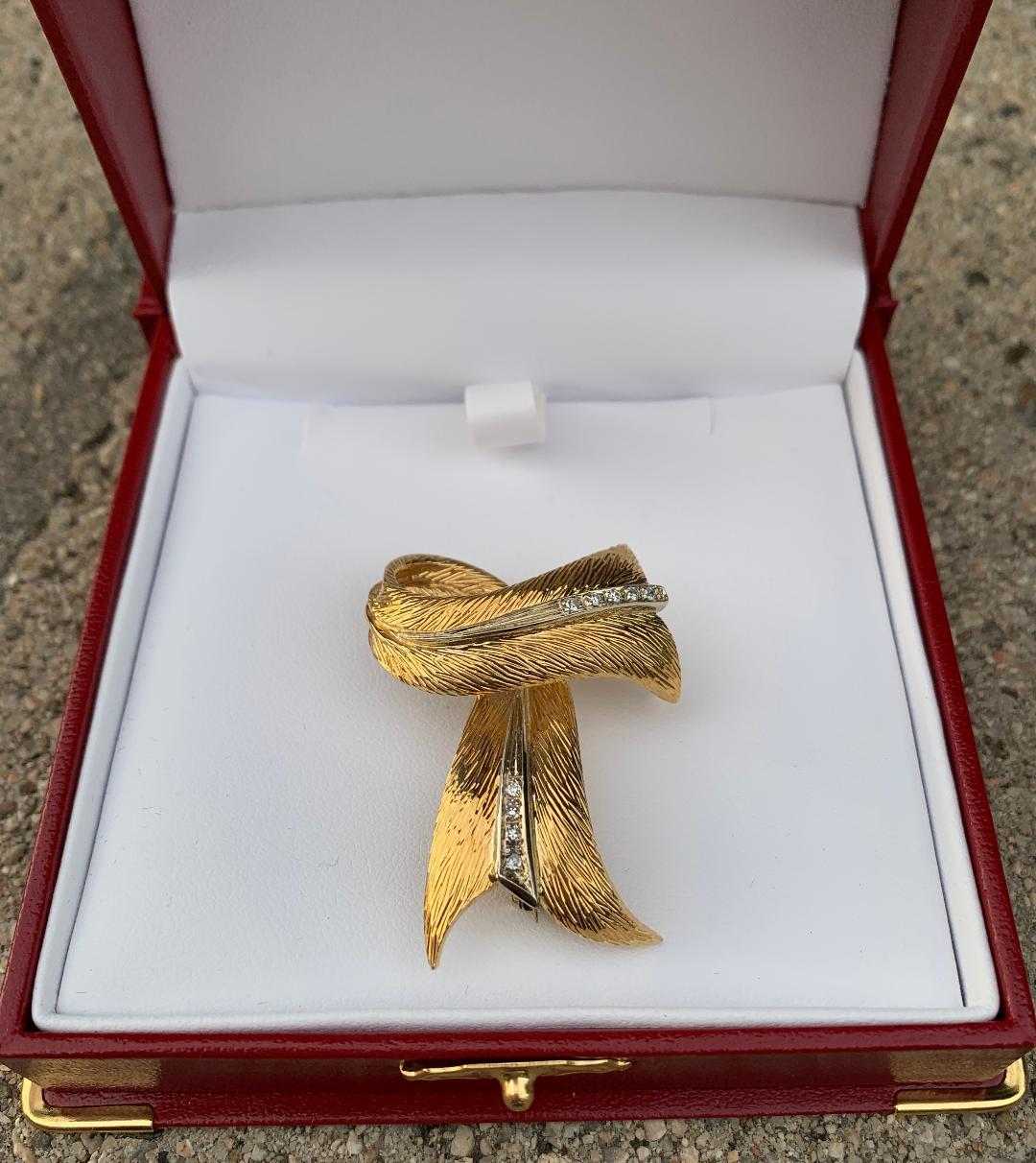 Women's or Men's Cartier 18 Karat Yellow Gold and Diamond Textured Bow Ribbon Design Brooch Pin