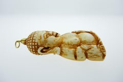 Cartier 18 Karat Yellow Gold and Natural Stone Buddha Pendant Vintage circa 1970