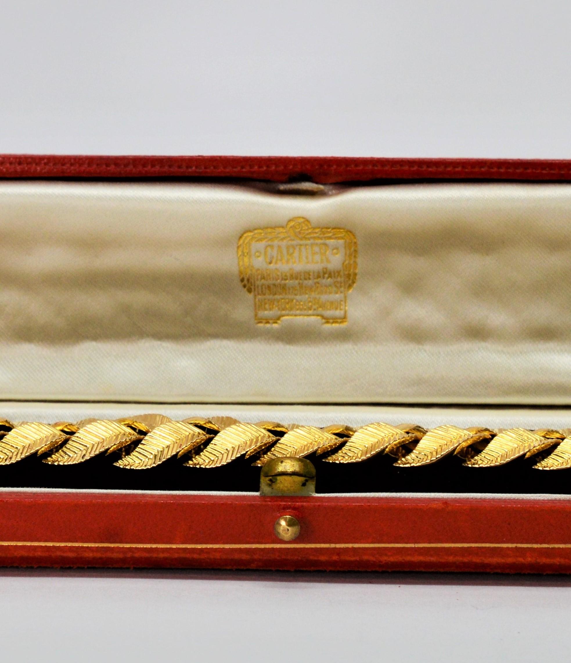 Cartier 18 Karat Yellow Gold Braided Leaf Bracelet In Excellent Condition For Sale In Mount Kisco, NY