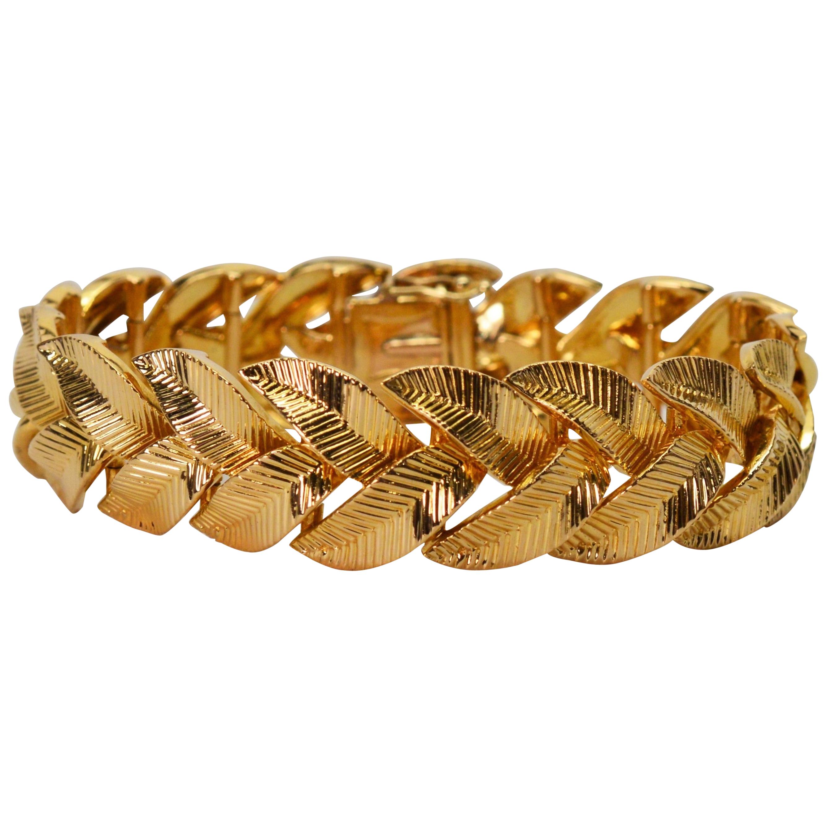 Cartier 18 Karat Gelbgold geflochtenes Blattarmband mit geflochtenem Blatt im Angebot