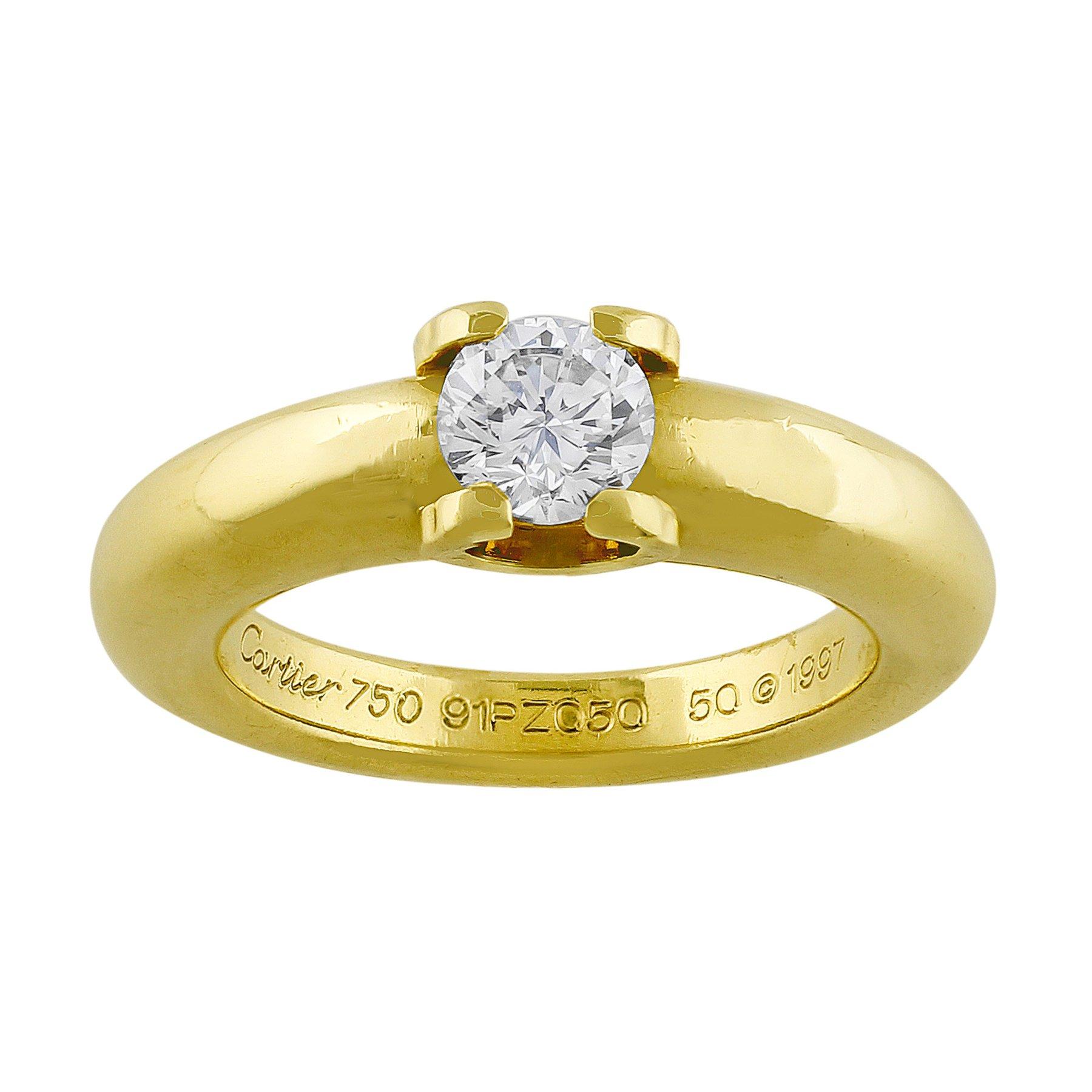 Estate Cartier Brilliant Cut Diamond Ring. Estate Cartier 18k yellow gold ring set with a certified round brilliant cut diamond of approximately 0.50cts.