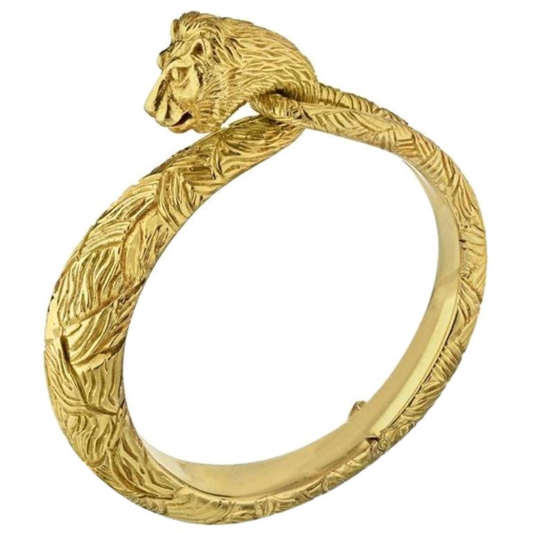 Cartier 18 Karat Yellow Gold Carved Lion Bangle Bracelet
