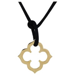 Cartier 18 Karat Yellow Gold Clover on Silk Cord Necklace