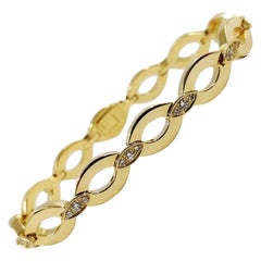 Cartier 18 Karat Yellow Gold and Diamond Link Bracelet