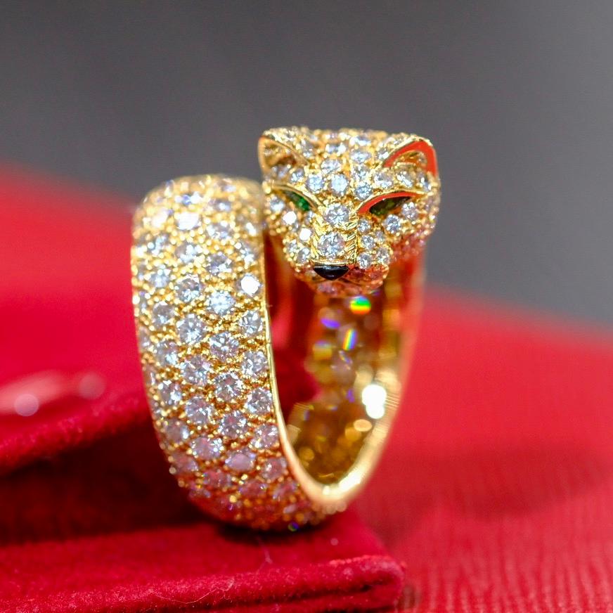 Women's or Men's Cartier 18 Karat Yellow Gold Diamond Panther Wrap Lakarda Ring