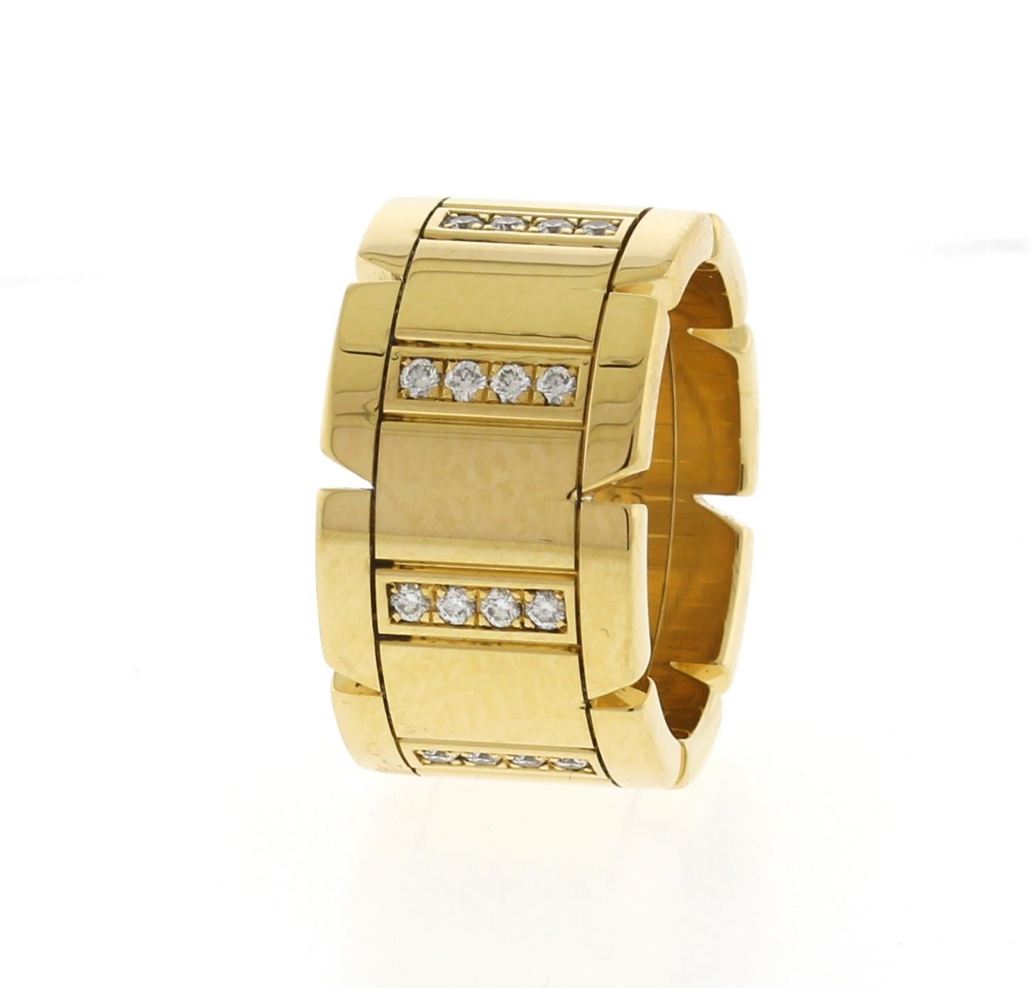 This iconic ring from Cartier's Tank Francaise collection is crafted in 18k yellow gold and set with 32 brilliant-cut round diamonds all the wat around totaling in 0.40 carats.   Made in France. 
Excellent pre-owned condition.
Thickness: