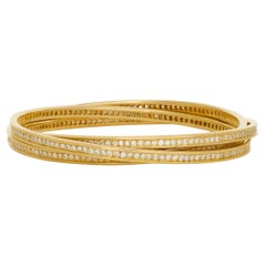 Cartier Bracciale Trinity Rolling con diamanti in oro giallo 18 carati