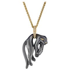 Cartier 18 Karat Yellow Gold Hematite Panther on an Vintage Chain Pendant