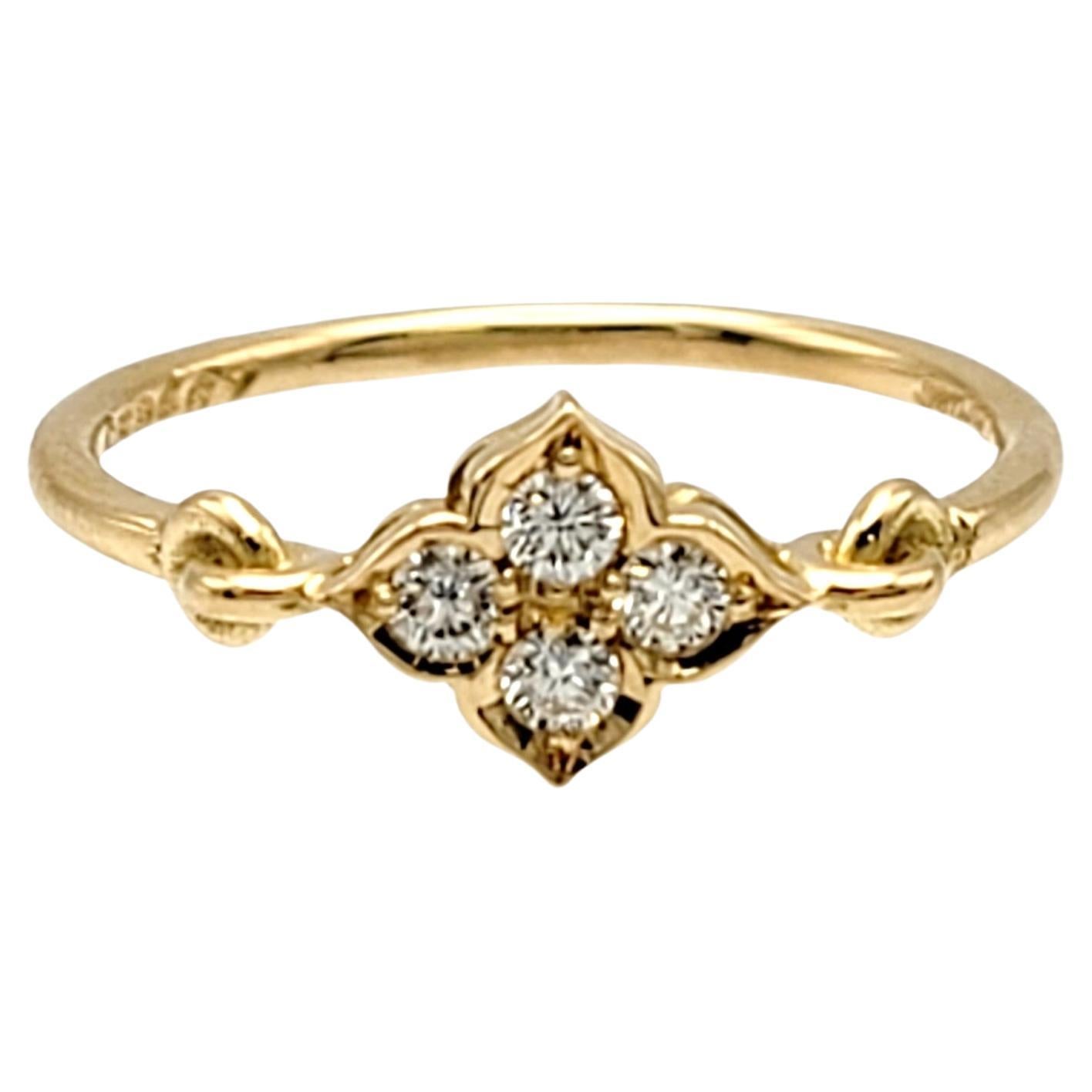 Ring size: 5

Delicate 18 karat yellow gold ring from Cartier accented by sparkling natural icy white diamonds. The charming, feminine piece features an ultra thin band with 4 round brilliant diamonds set in a clustered floral design at the