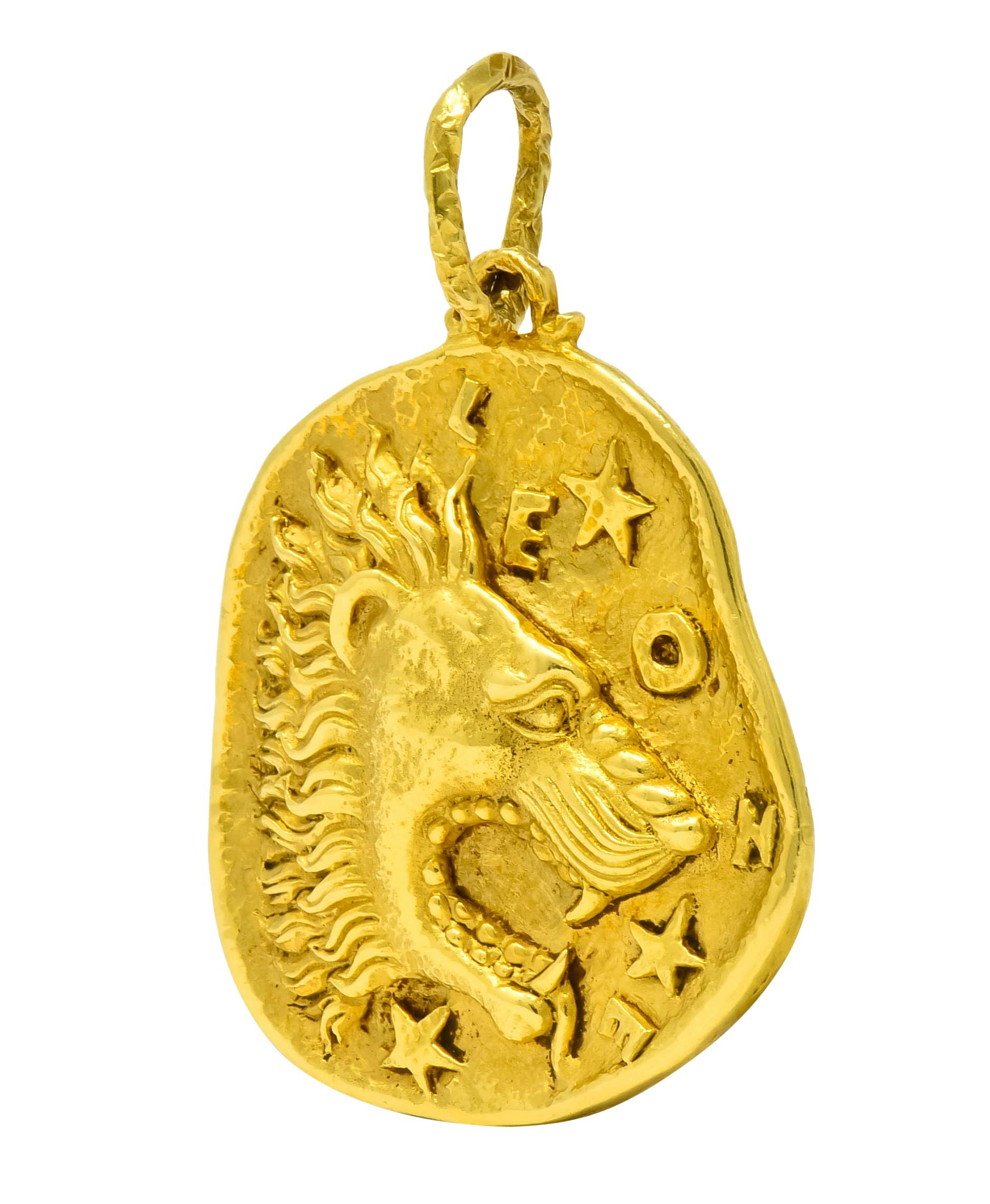 Centering a ferocious raised lion representing Leo zodiac sign in high polished and matte gold

Textured 