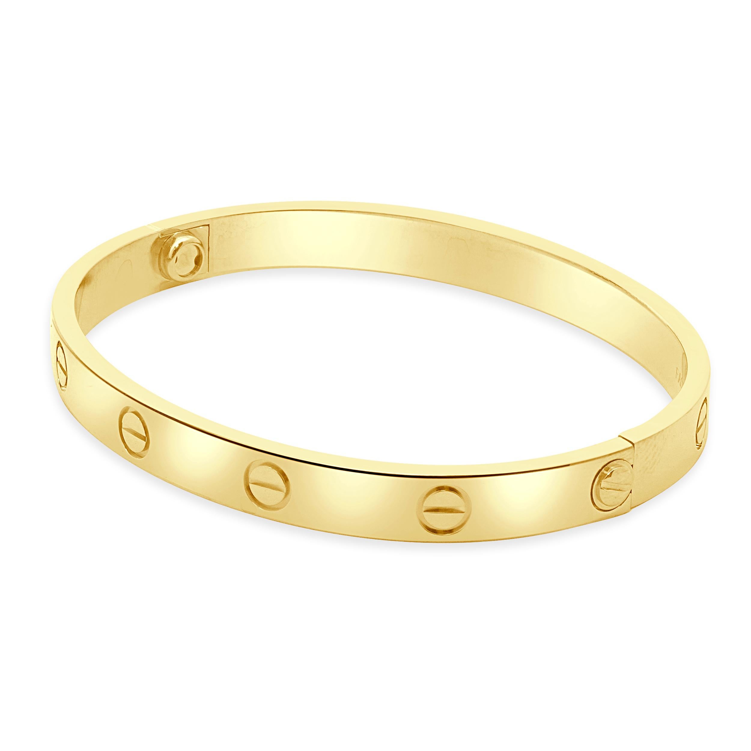 Designer: Cartier
Material: 18K yellow gold
Serial # FAQXXX
Size: 17

No box or papers included
