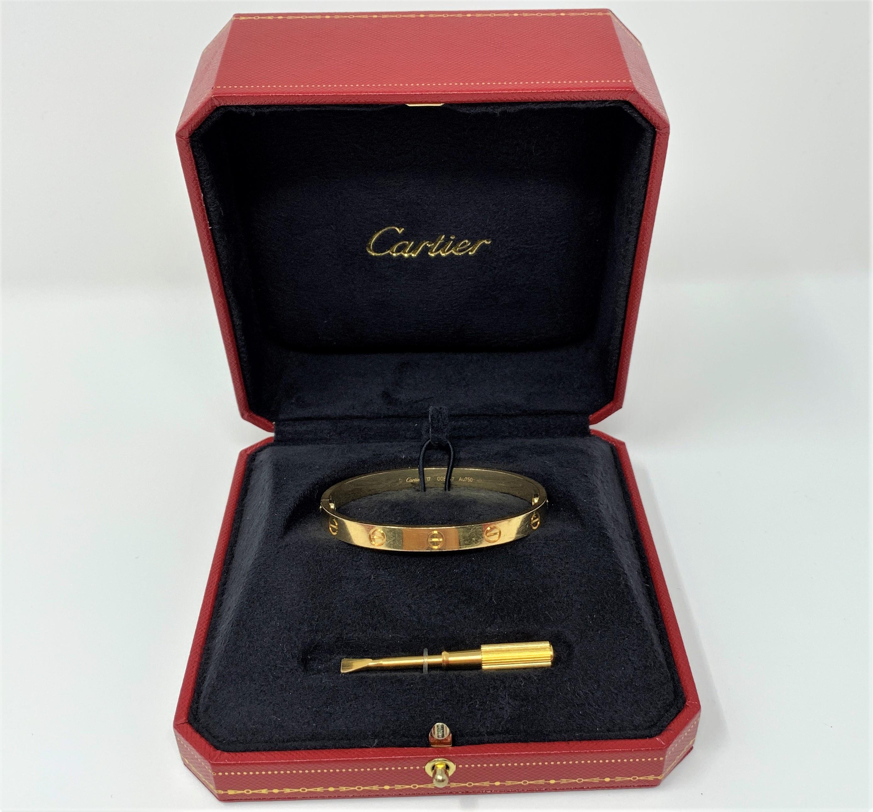 Cartier 18k Yellow Gold Authentic Love Bracelet Size 17 Excellent Condition

Condition:  Excellent, Normal Surface Wear, No Scratches, Dents, Dings, Etc.
Metal:  18k Gold (Marked, and Professionally Tested)
Weight:  32.6g 
Length:  Size 17, Approx 7