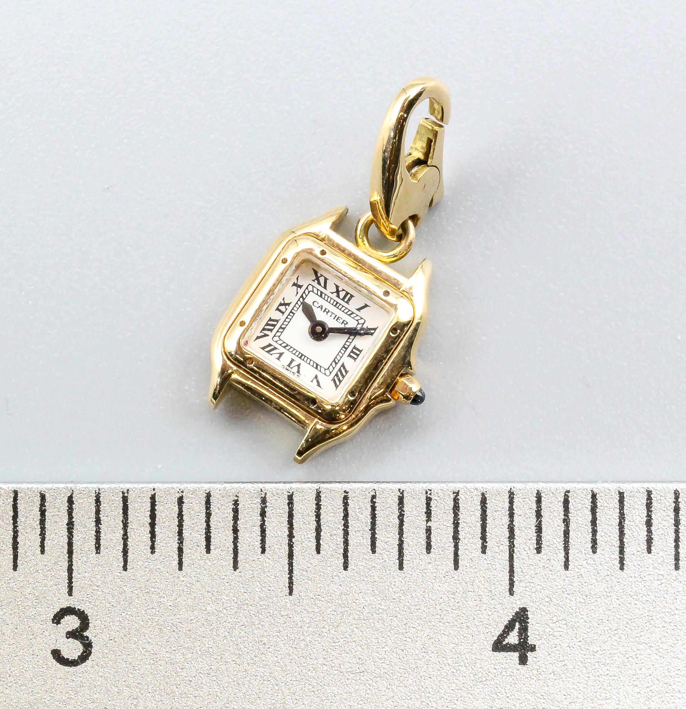 Fine and rare 18k yellow gold Panthere de Cartier watch charm by Cartier.

Hallmarks: Cartier, 750, reference numbers, French 18k gold assay marks, maker's mark.