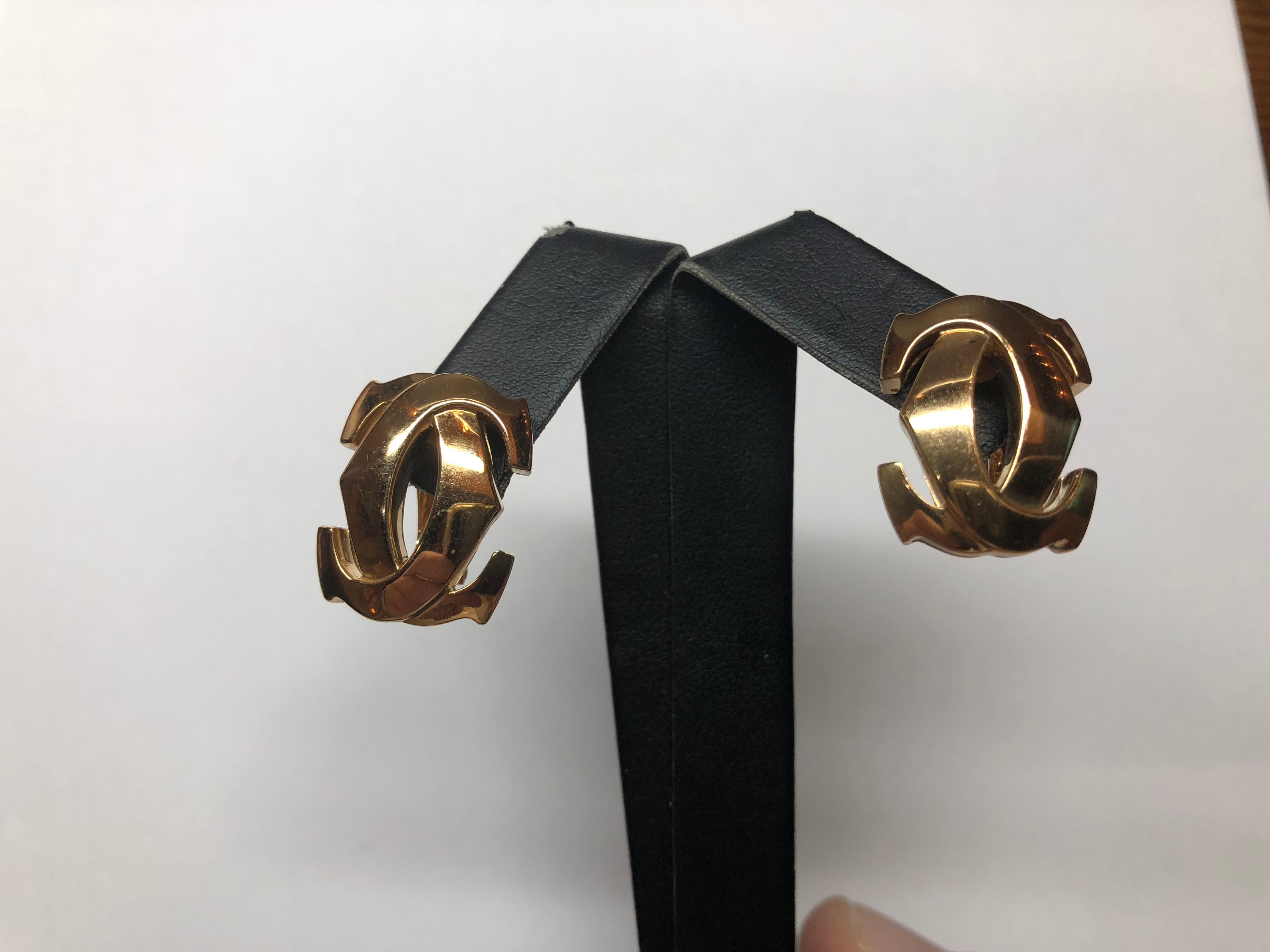 Cartier 18K Yellow Gold Penelope Double C earrings weighing 18 grams.  Excellent pre-owned condition.  Serial number 818828.