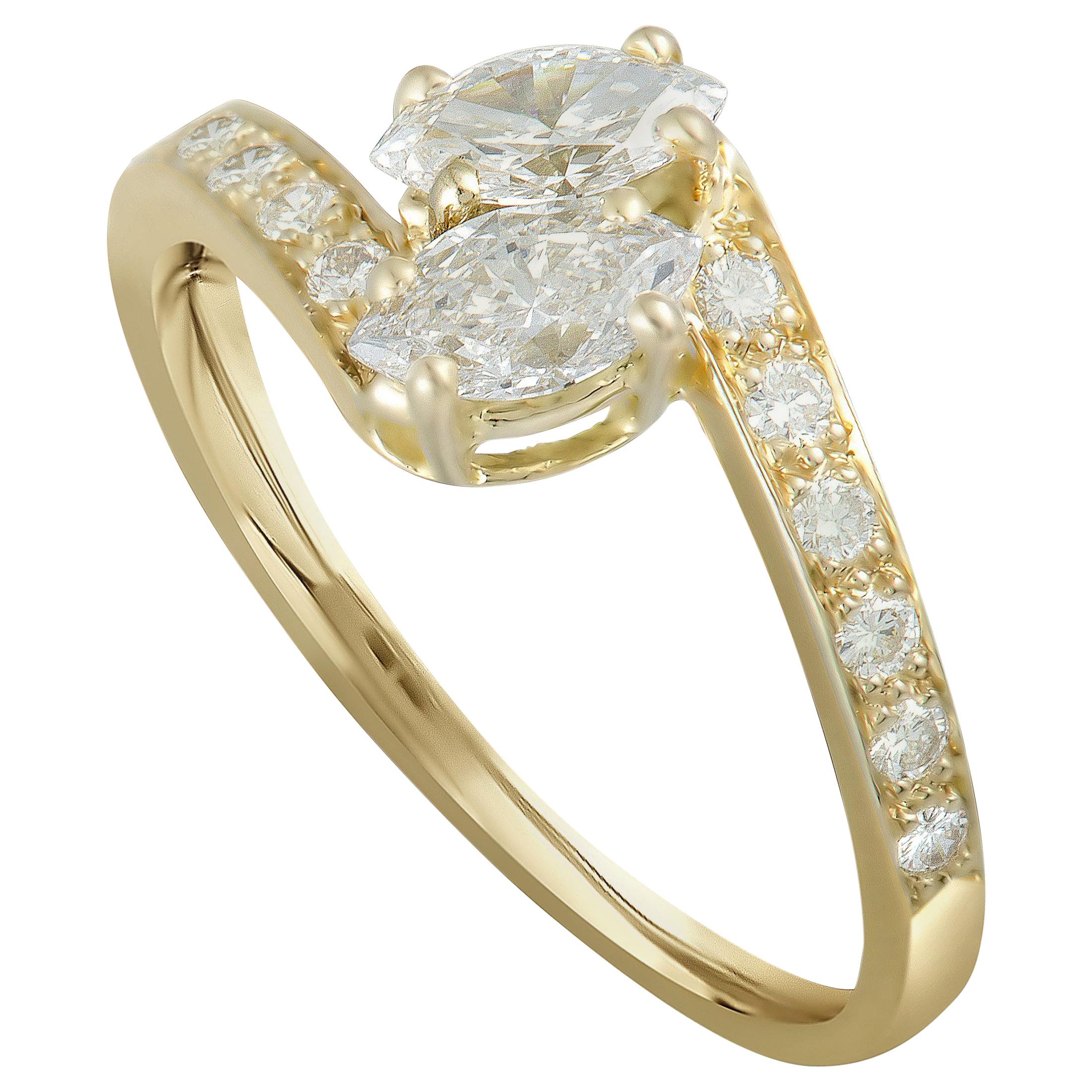 Cartier 18 Karat Yellow Gold Round and 2 Marquise Diamonds Bypass Ring