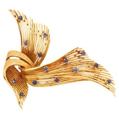 Cartier 18 Karat Yellow Gold Round Cut Sapphire Spray Vintage Ribbon Brooch