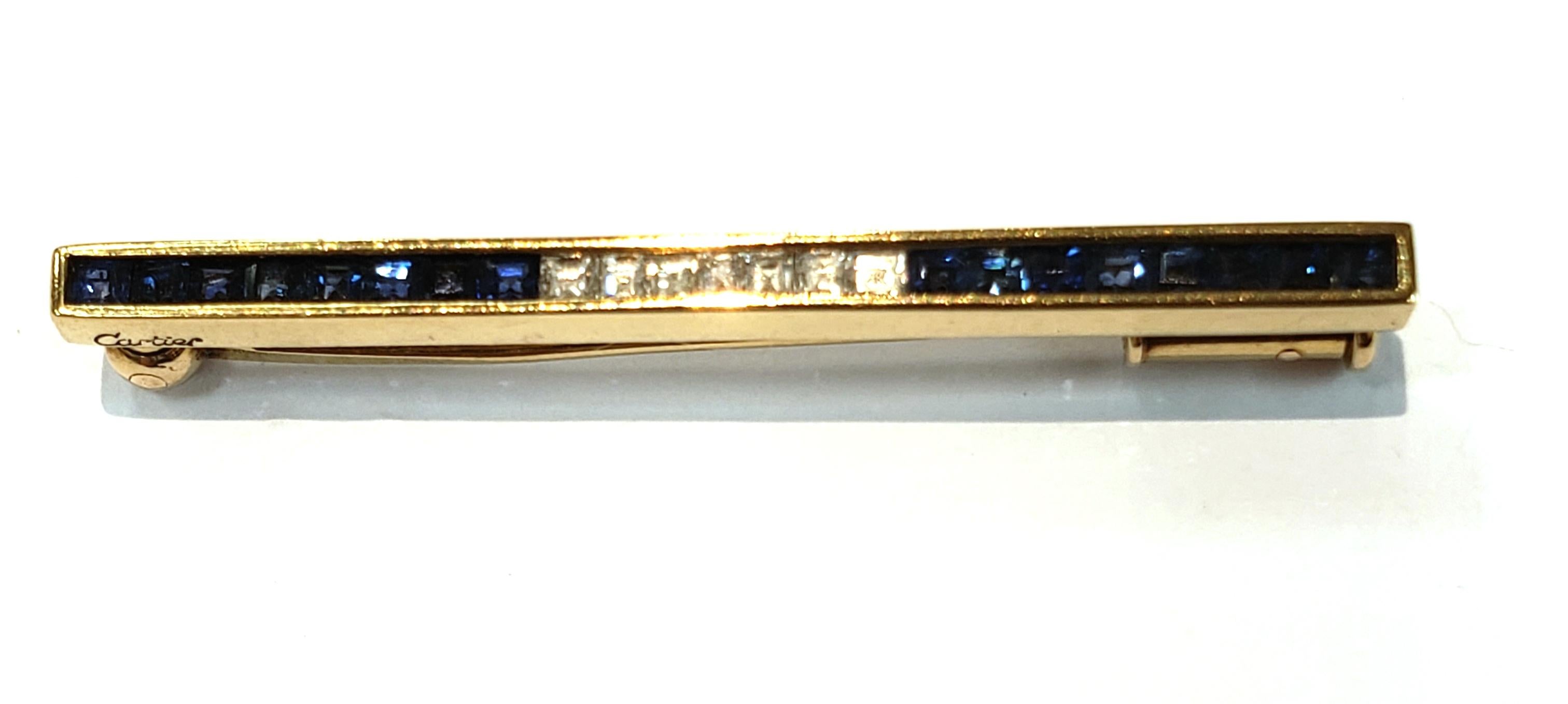 This Beautiful Vintage Cartier Bar Pin Will Highlight Any Outfit!  18 Karat Yellow Gold, With Channel Set Square Blue Sapphires
& Diamonds. Each Sapphire Section Has 8 Stones, Diamond Section Has 7 Stones. Approximately 0.40 Carat  Medium Blue