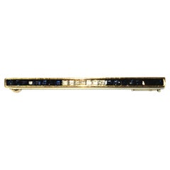 Cartier 18 Karat Yellow Gold, Square Cut Diamond and Sapphire Bar Pin