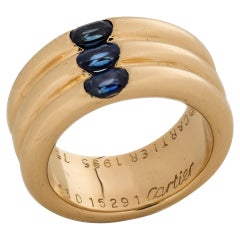 Cartier 18 Karat Yellow Gold Triple Ring Band with Blue Sapphires