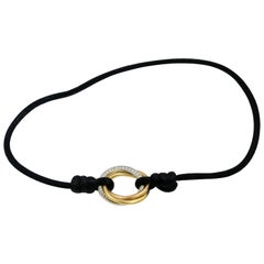 Cartier 18 Karat Yellow Rose and White Gold Trinity Diamond Black Cord Bracelet