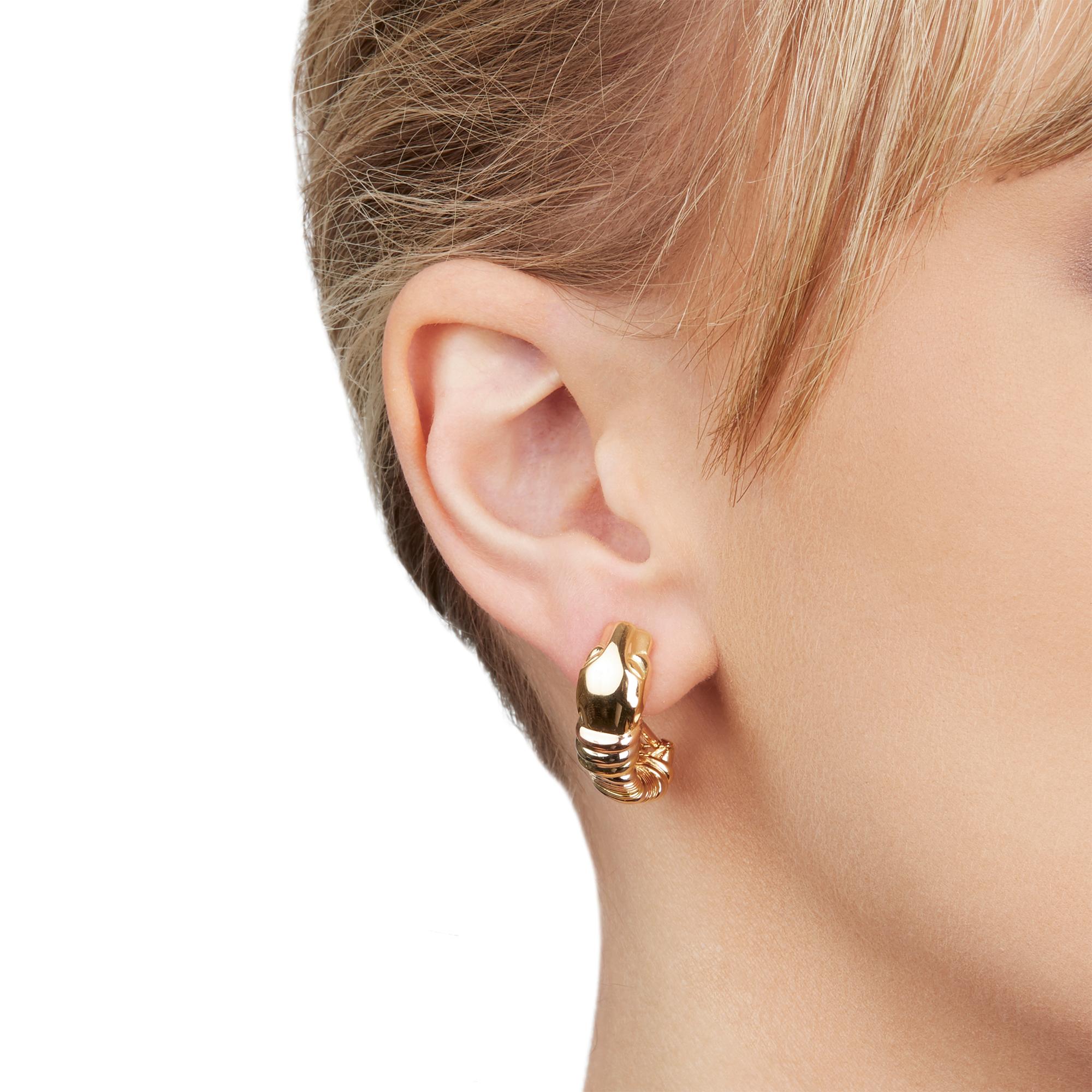 These Earrings by Cartier are from their Panthère collection and feature their signature Panthère design made in 18k Yellow, White & Rose Gold. The Earring length 2.5cm and the width is 8mm. These Earrings have secure lever backs. Complete with