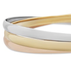 Cartier 18 Karat Yellow, White, and Rose Gold Trinity Bangle