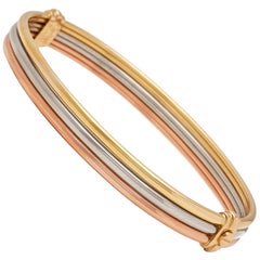 Cartier 18 Karat Yellow, White and Rose Gold Vintage Trinity Bracelet
