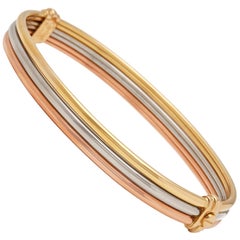 Cartier 18 Karat Yellow, White and Rose Gold Vintage Trinity Bracelet