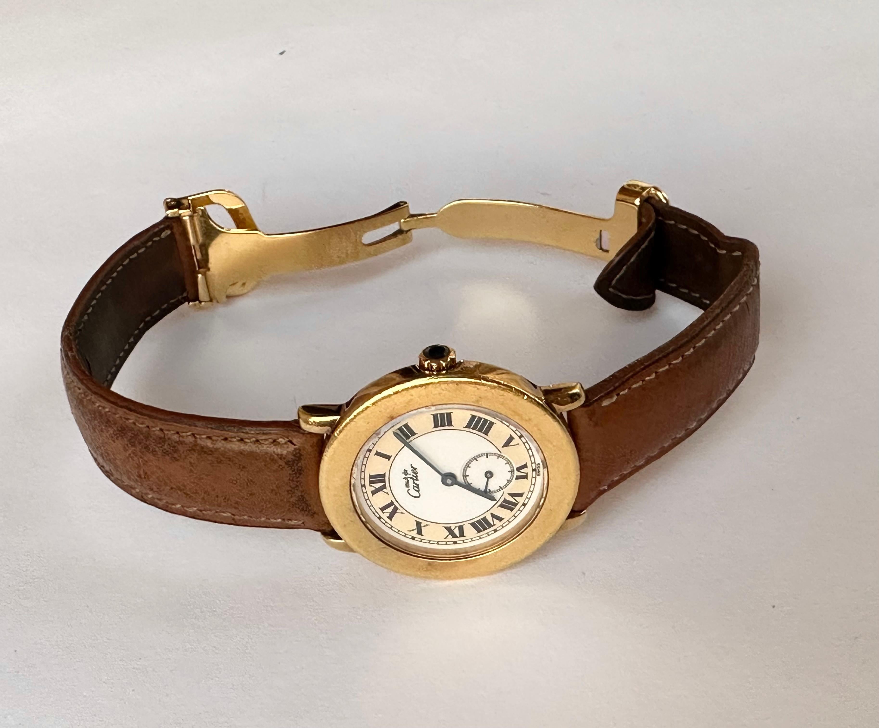 Brand: Cartier

Model: Must de Cartier

Reference Number: 1810 1

Country Of Manufacture: Switzerland

Movement: Quartz

Case Material: Silver 925 Gold Plated

Measurements : Case width: 32 mm. (without crown)

Band Type : Leather

Band Condition :