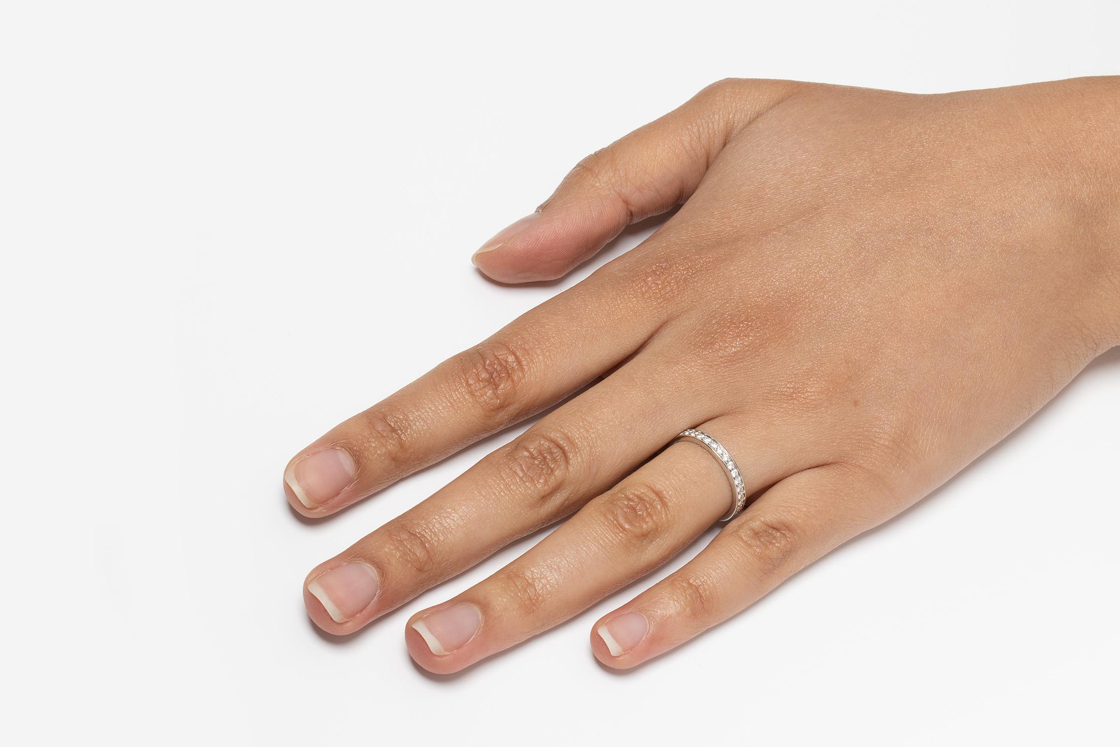 From Cartier’s ‘1895’ collection is this lovely platinum half eternity band. The diamonds have been grain set and total to 0.27 carat. They are all F in colour and VVS in clarity. All original hallmarks can be seen inside the band.

Gemstone:
