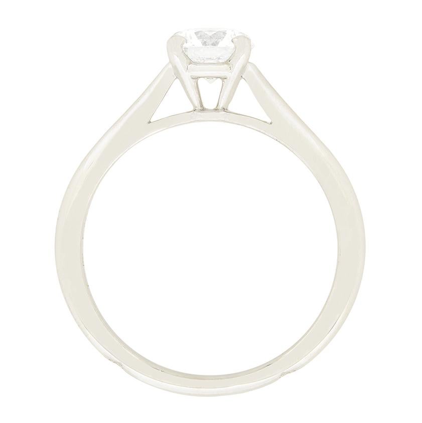 A sparkling round brilliant diamond takes centre stage in this timeless solitaire engagement ring from Cartier’s ‘1895’ collection. The 0.50 diamond is of high quality, as expected from Cartier with colour of G and clarity of VVS2. The stone is claw