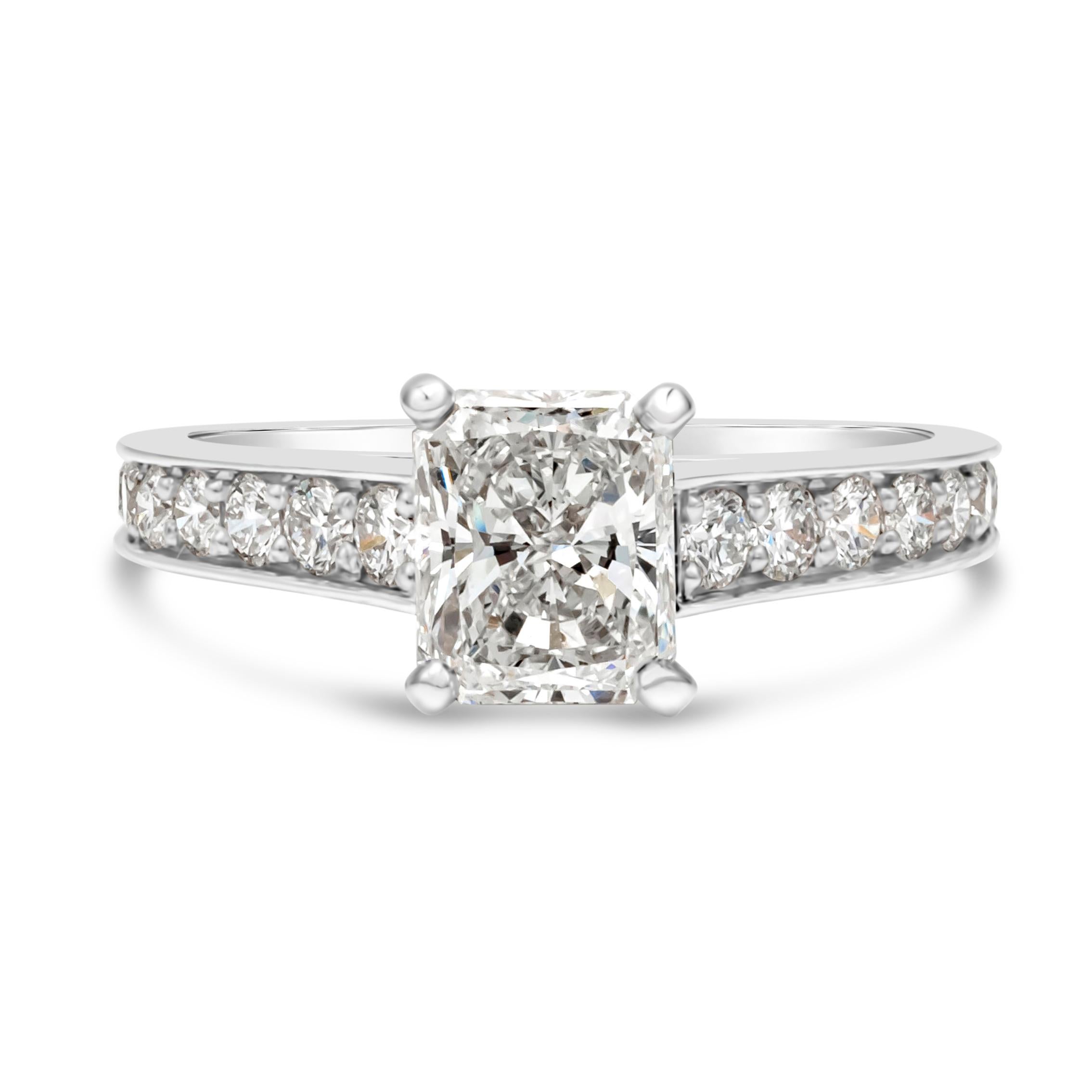 A radiant cut engagement ring made, signed and numbered by Cartier. Part of the 1895 Collection of Cartier. Set with a 1.03 carats radiant cut diamond center stone that GIA certified as G color VVS1 clarity. 22 round brilliant diamonds weighing 0.60