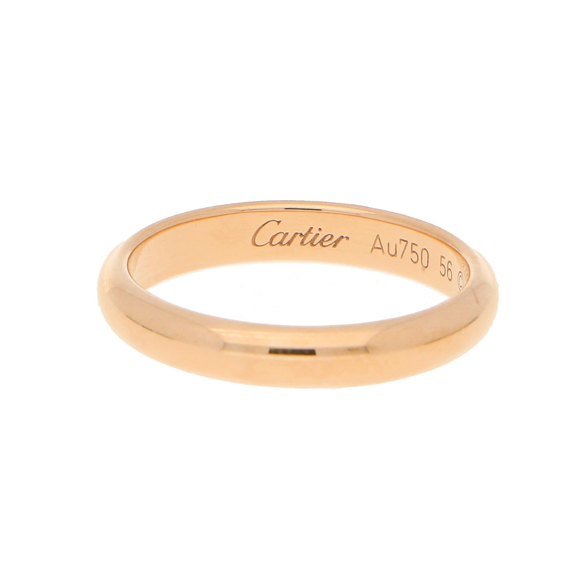 An elegant 18-karat yellow gold high-dome wedding ring, from Cartier's 1895 Collection. This ring is a finger size 8 but it could be sized to order. Dimensions: 3.5mm wide. Accompanied by Cartier's original box.