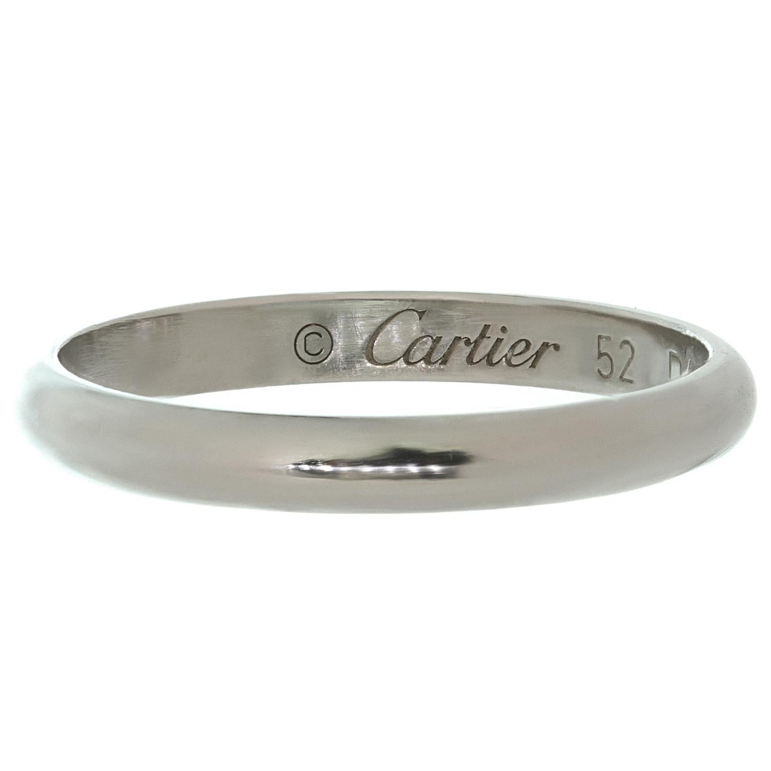 This classic Cartier 1895 wedding band is crafted in 950 platinum and measures 2.0mm in width. Made in France circa 2020s. Measurements: 0.078