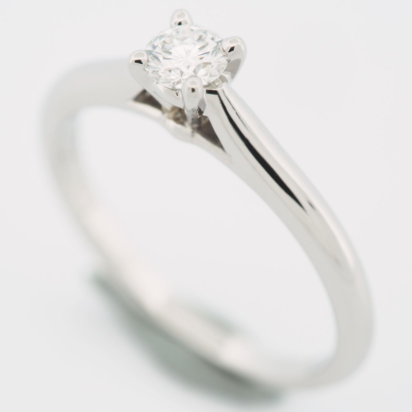 Item: Authentic Cartier 1895 Diamond Solitaire Ring
Stones: Diamond (0.18ct)
Color: F
Clarity:VVS2
Polish: Good
Symmetry: Excellent
Fluorescence: None
Metal: Platinum 950
Ring Size: 49 US SIZE 4.75 UK SIZE I 3/4
Internal Diameter: 15.50