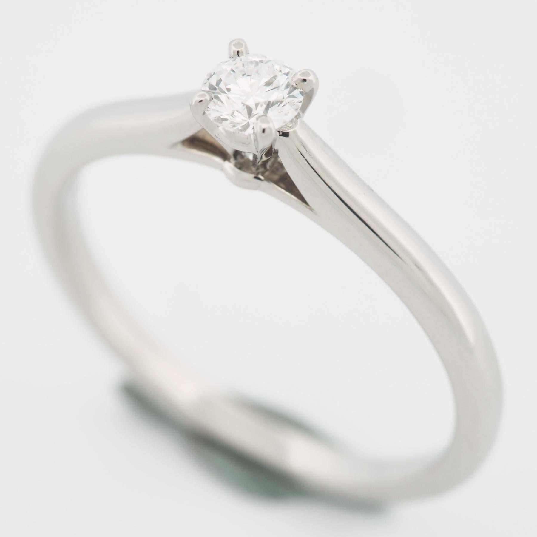 Item: Authentic Cartier 1895 Diamond Solitaire Ring
Stones: Diamond (0.24ct)
Color: D
Clarity:VVS2
Polish: Excellent
Symmetry: Excellent
Fluorescence: Faint
Metal: Platinum 950
Ring Size: 58 US SIZE 8.25 UK SIZE Q
Internal Diameter: 18.45