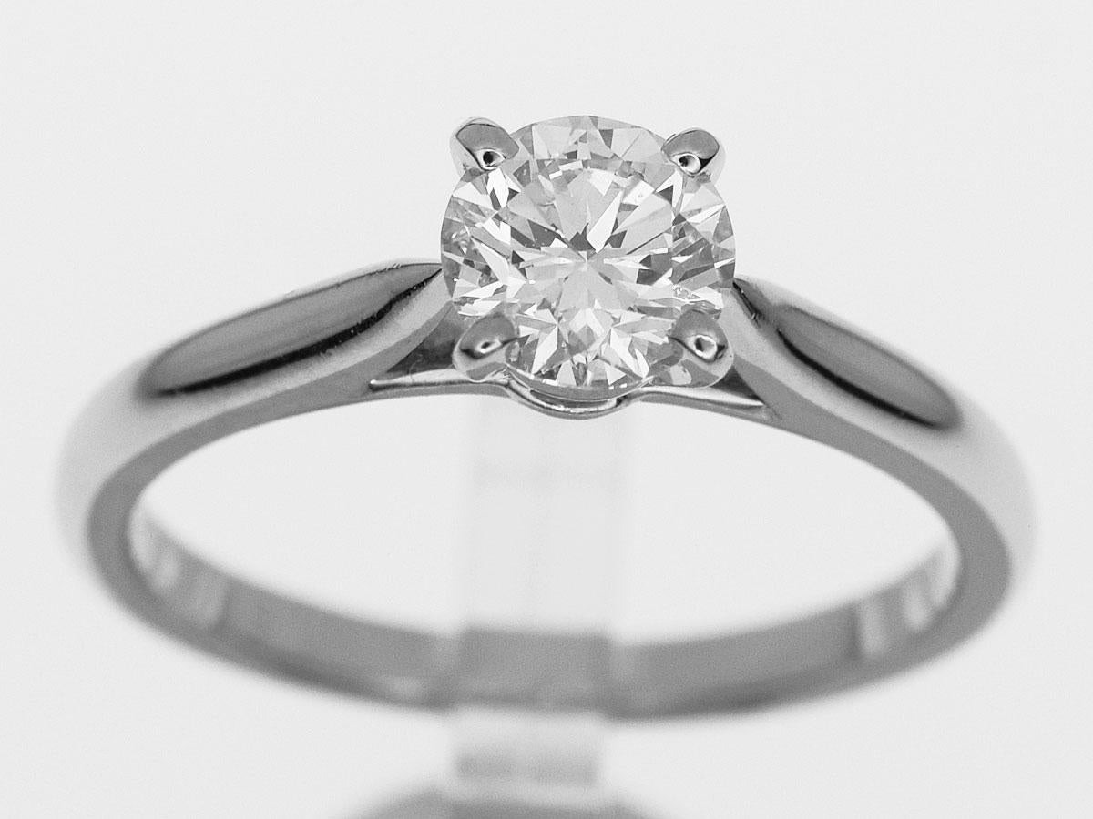 engagement ring cartier 1895 vs tiffany setting